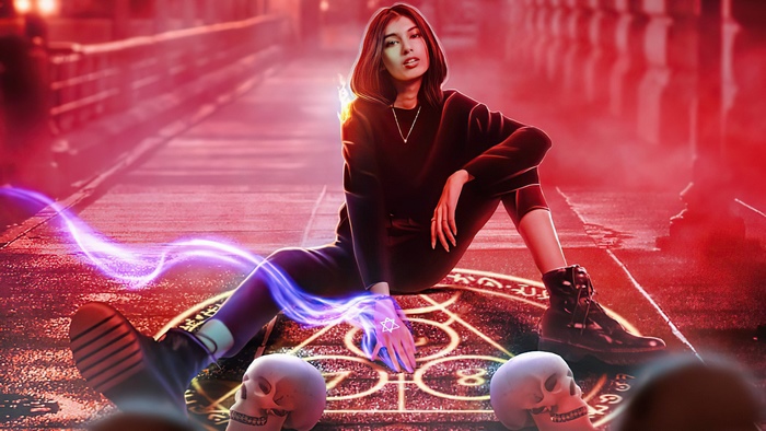 Woman with magic circle and skulls