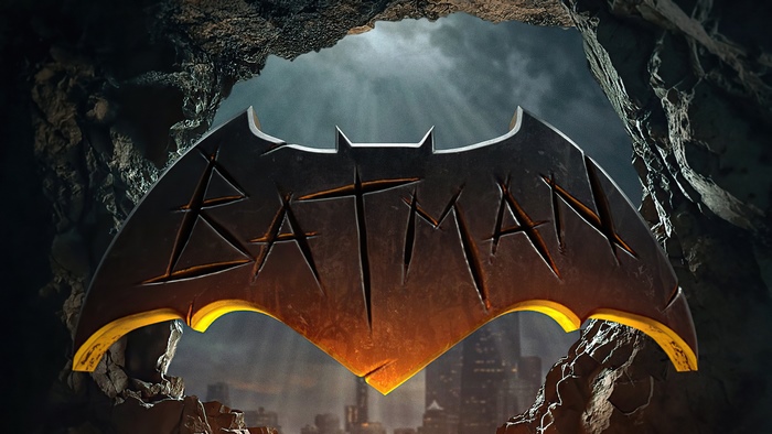 The Batman logo in a cave