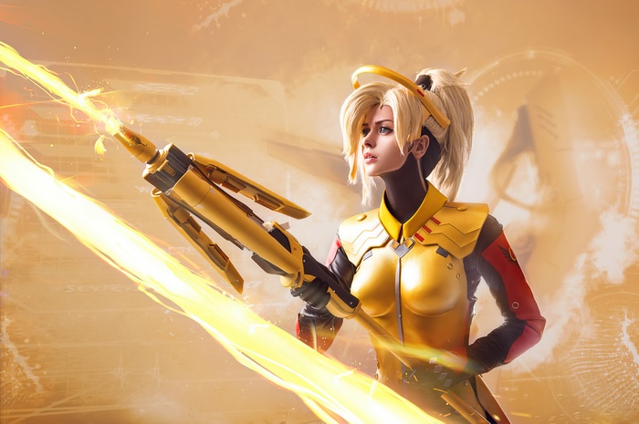 Mercy from Overwatch 2 cosplay with Caduceus Staff