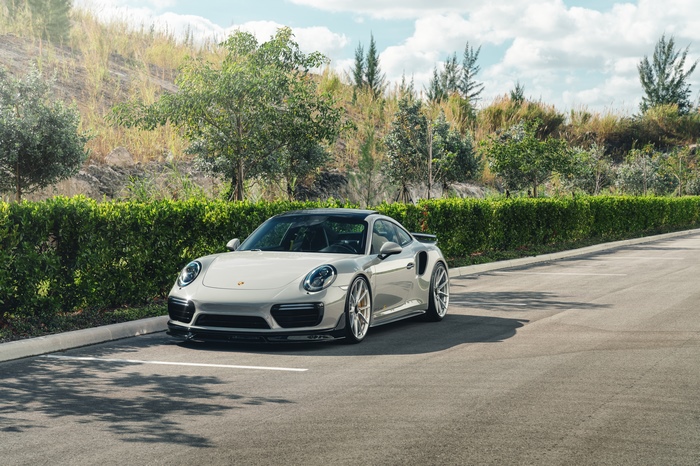 Porsche 911 Turbo S parked on asphalt