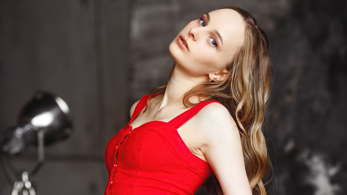 Blonde girl in a red dress