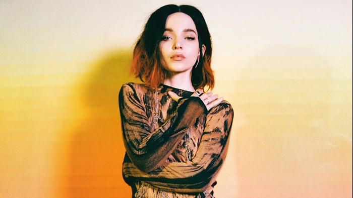 Dove Cameron posing for a photoshoot