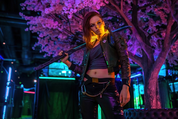 Cosplayer with sword in Cyberpunk 2077 style