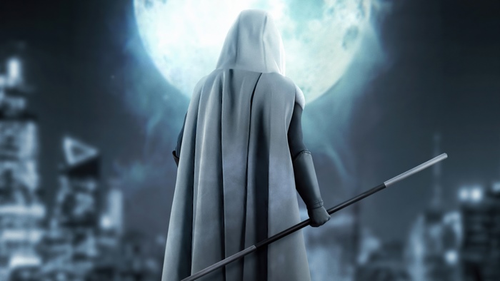 Moon Knight with a staff in front of the moon