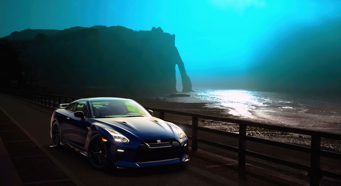 Blue Nissan GT-R on a coastal road