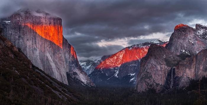 Yosemite Valley mountains at sunset with dramatic clouds