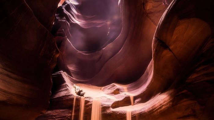Sunbeams illuminating Antelope Canyon sandstone walls