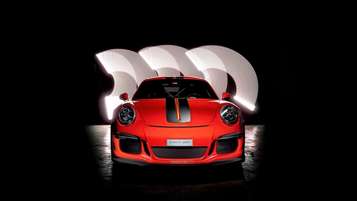 Red Porsche GT3 with racing stripes