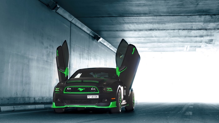 Ford Mustang with butterfly doors in a tunnel