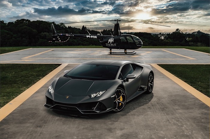 Lamborghini Huracan Evo and Helicopter on Helipad