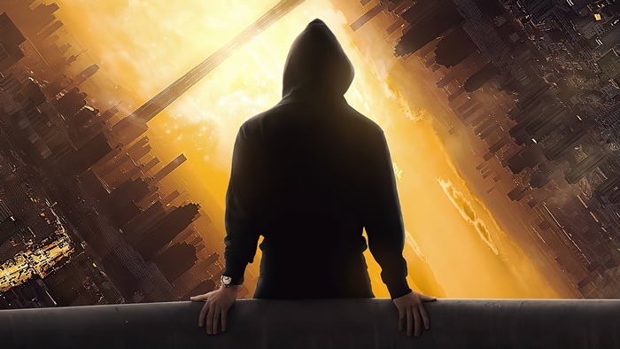 Man in hoodie overlooking surreal cityscape