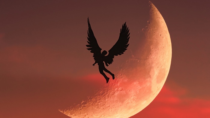 Silhouette of an angel with wings flying near a crescent moon