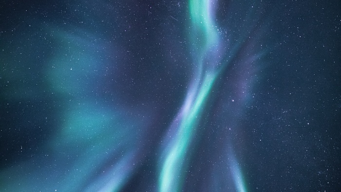 Aurora Borealis over a starry night sky
