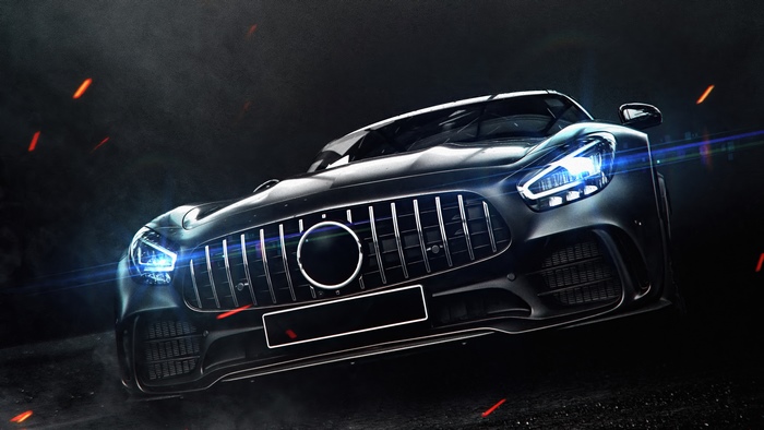 Black Mercedes-AMG GT R car with glowing headlights