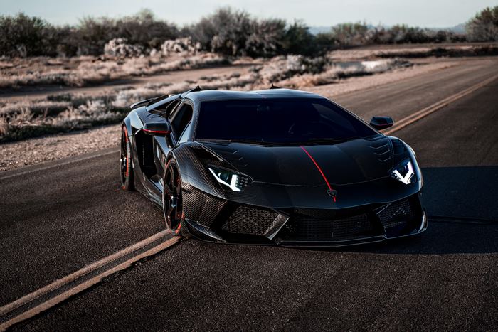 Black Lamborghini Aventador on a Desert Road