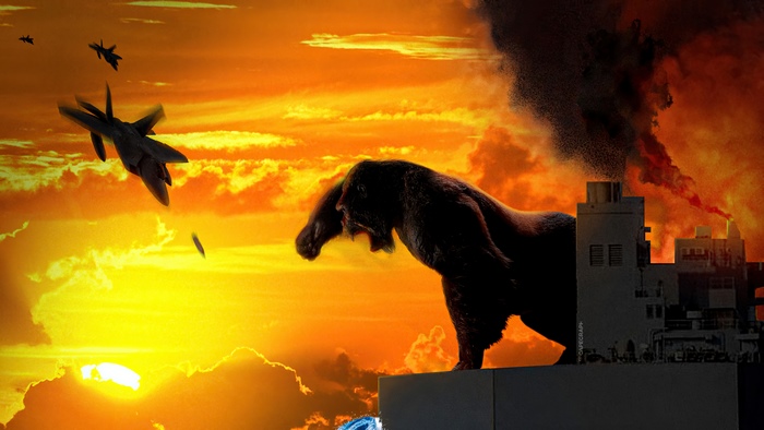 King Kong and jets over city at sunset