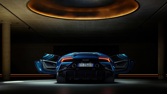 Blue Lamborghini Huracan Evo with Doors Open