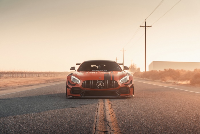 Orange Mercedes-AMG GT R on a road