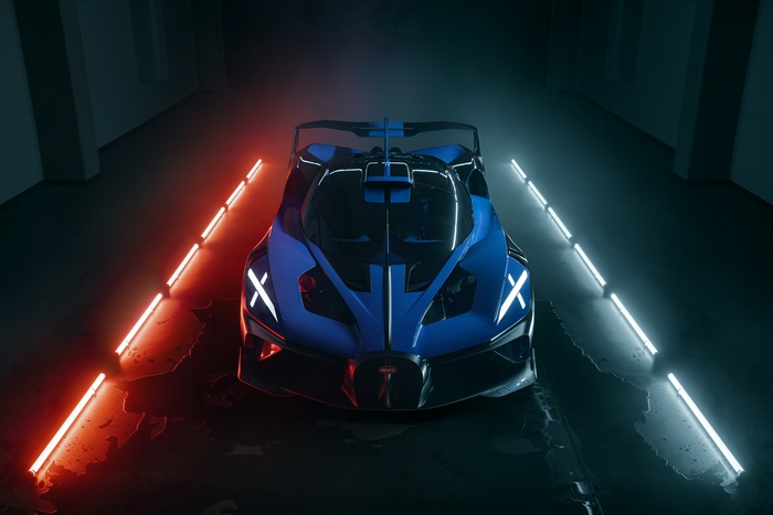 Bugatti Bolide car in a dark tunnel with neon lights
