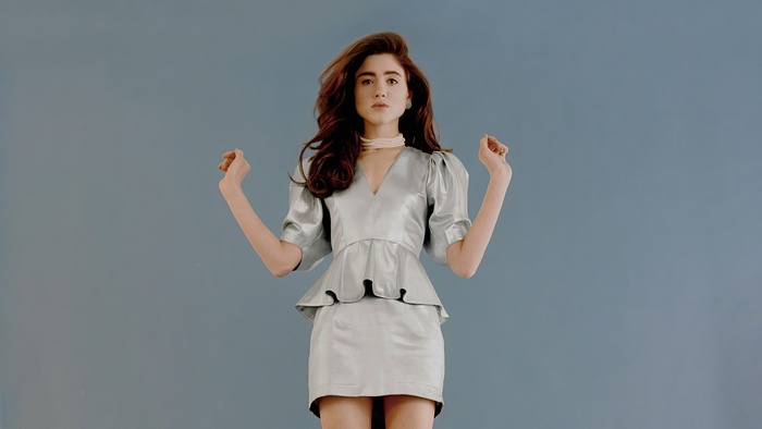 Natalia Dyer in a silver dress