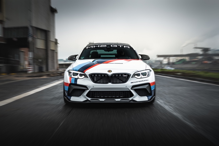 BMW M2 GTR racing car on a track