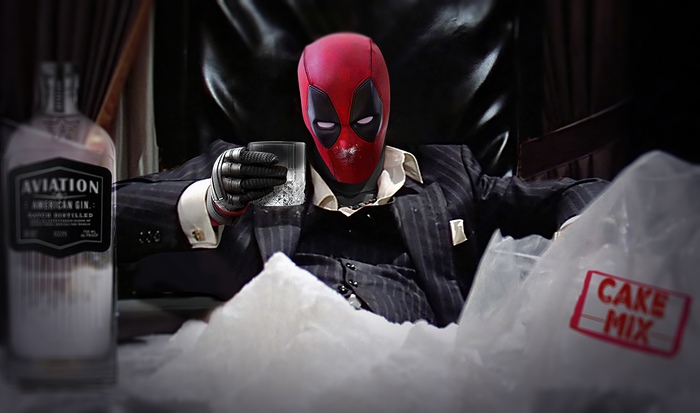 Deadpool in a suit with gin and cake mix