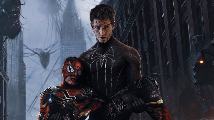 Spider-Man carrying injured Spider-Man in a destroyed city