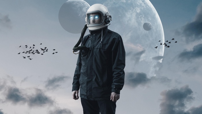 Astronaut with glowing eyes and planets