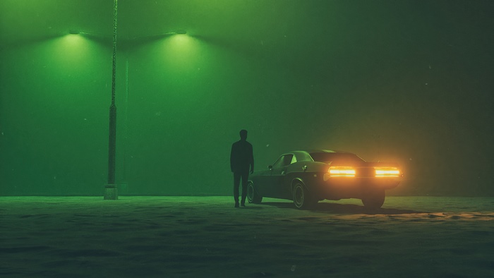 Man and car under green lights
