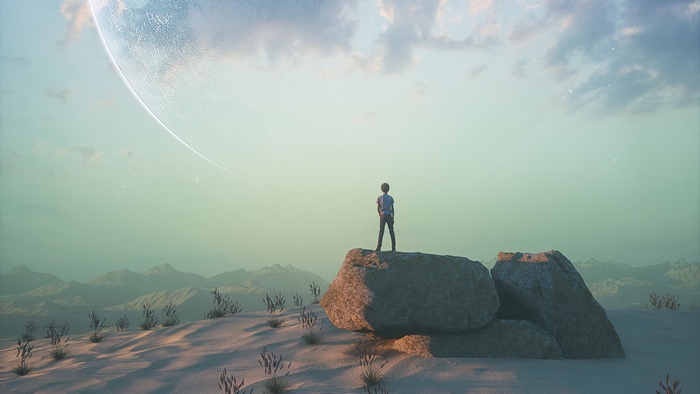 A lone figure stands on rocks in a desert landscape with a large planet in the sky