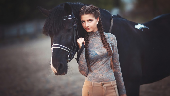 Girl with a black horse