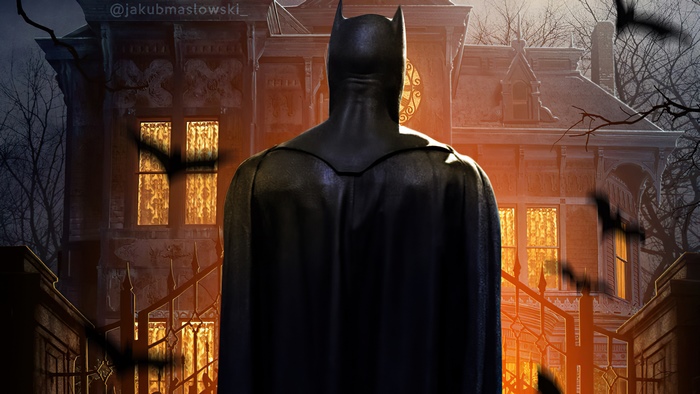 Batman in front of a haunted house with bats