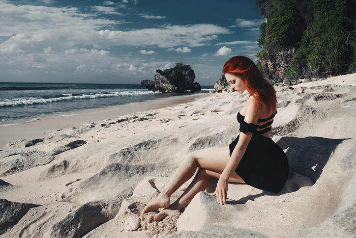 Redhead Model in Black Dress on Beach