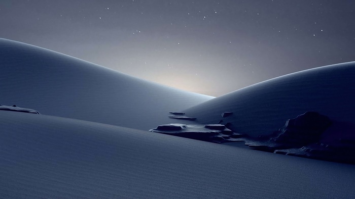 Desert dunes under starry sky
