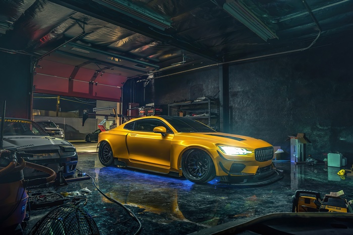 Yellow Volvo modified car in a garage