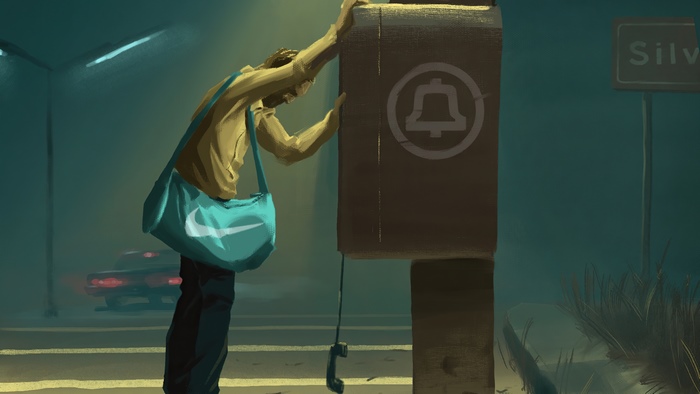 Man at a payphone with a Nike bag