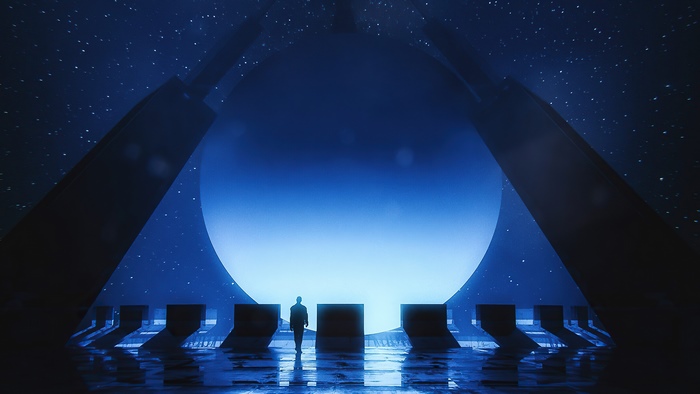 Man in front of a large blue portal
