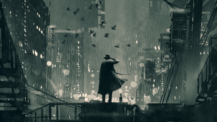 Man in trench coat in rainy city