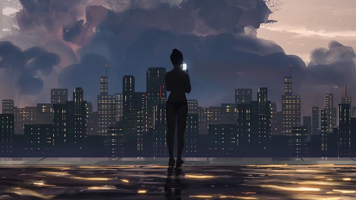 Woman with phone overlooking city skyline at night