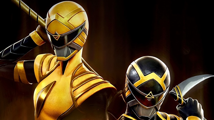 Two Power Rangers in gold and black suits