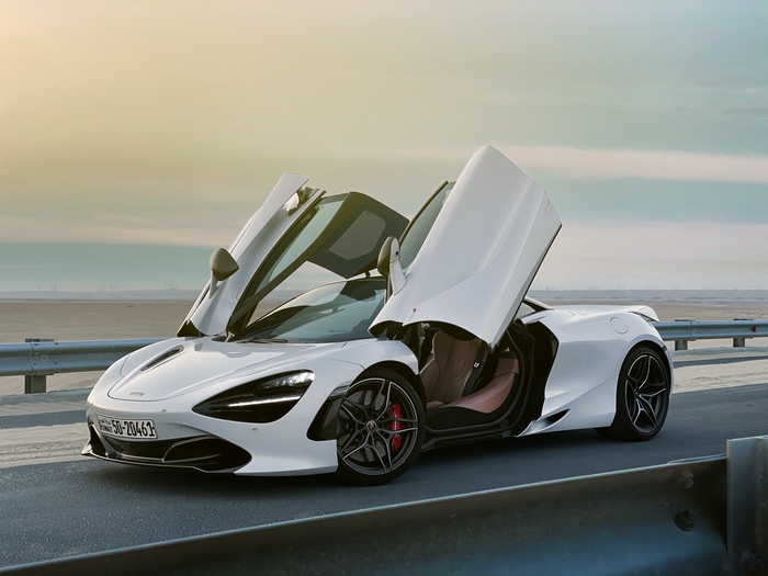 White McLaren 720S with butterfly doors open