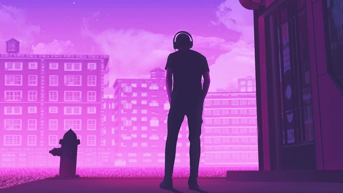 Silhouette of a person with headphones in a city at night
