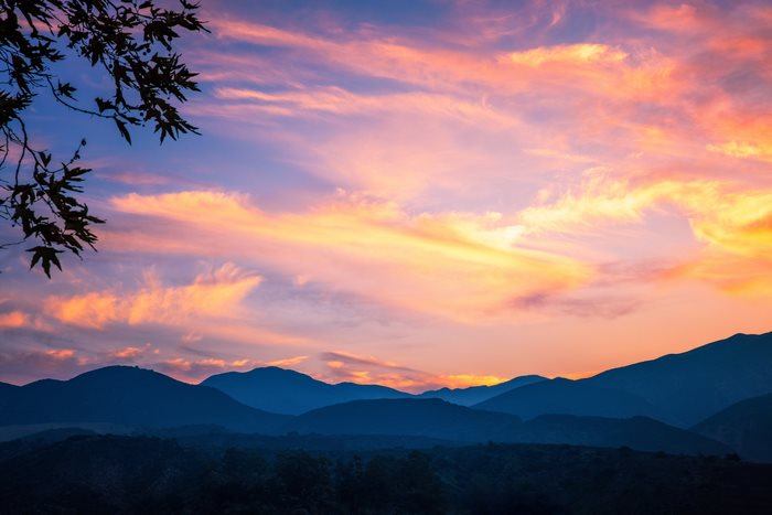 Sunset over mountains with colorful sky