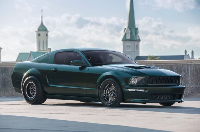 Green Ford Mustang parked outdoors