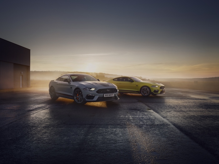 Ford Mustang Mach 1 cars at sunrise