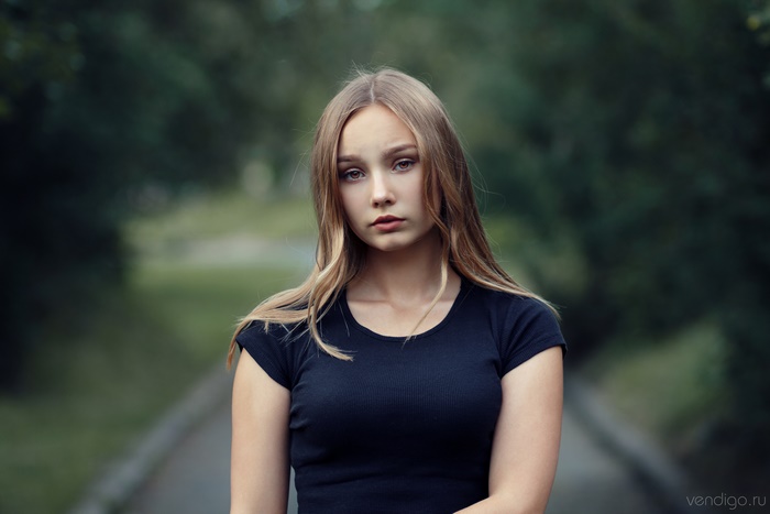 Portrait of a Young Girl in Black T-Shirt