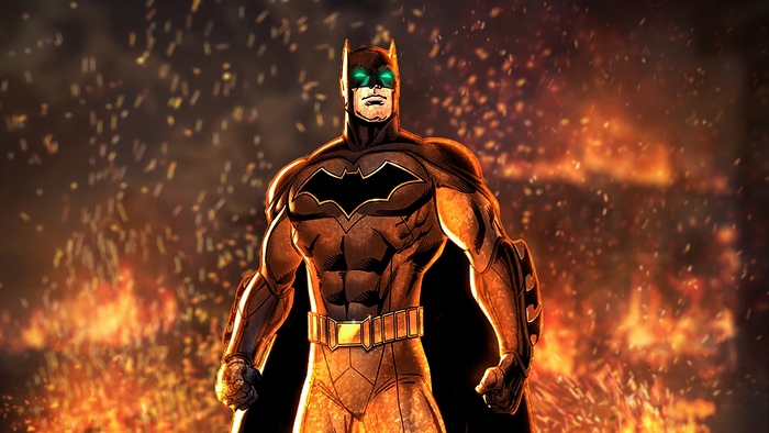Batman standing in front of a fire
