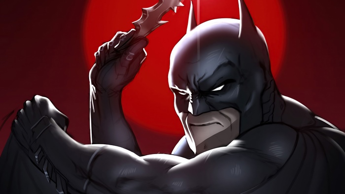 Batman holding a Batarang