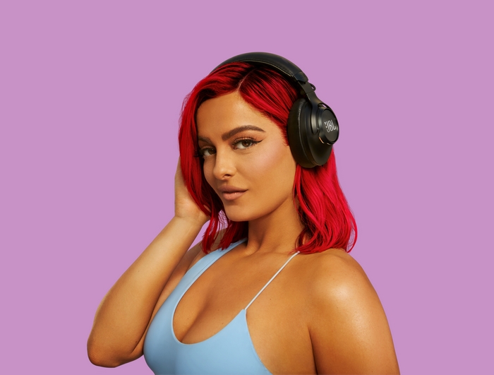 Bebe Rexha wearing JBL headphones