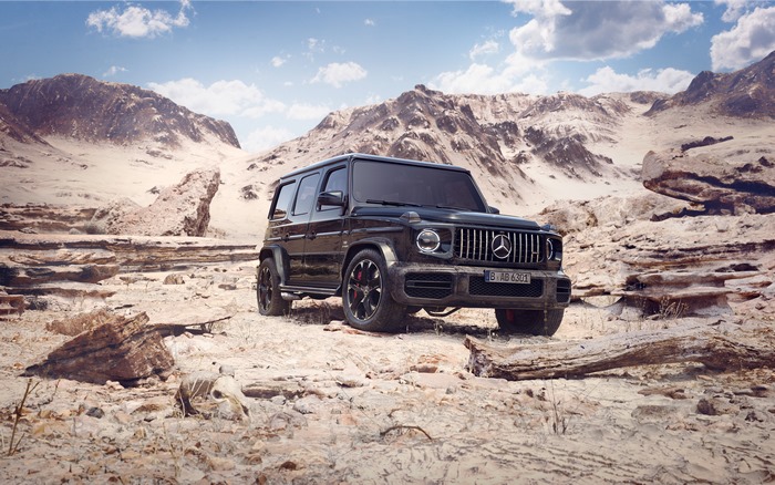 Mercedes-Benz G-Class SUV in a desert landscape